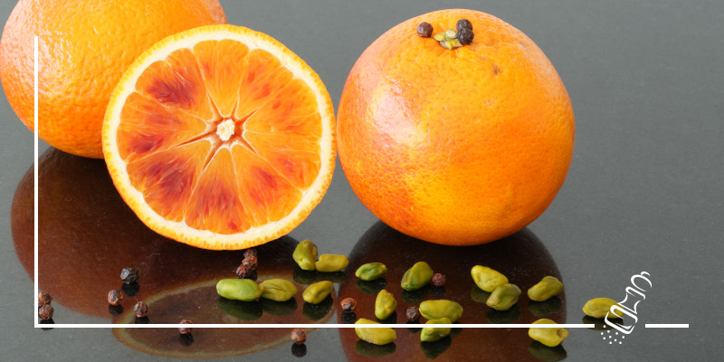orangendessert mit pfeffer und pistazien