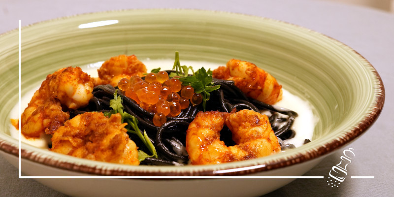 spaghetti al negro an parmesansauce